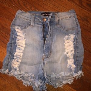 Ripped high rise jean shorts